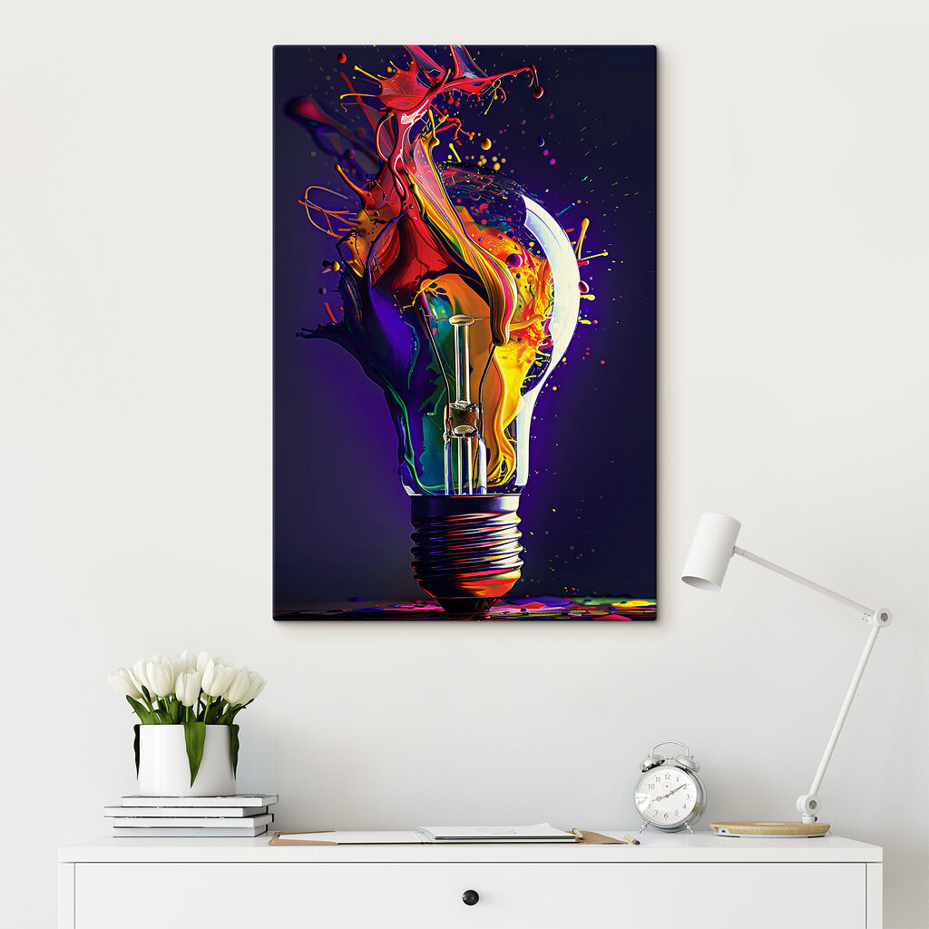 A light bulb with colorful paint splashing