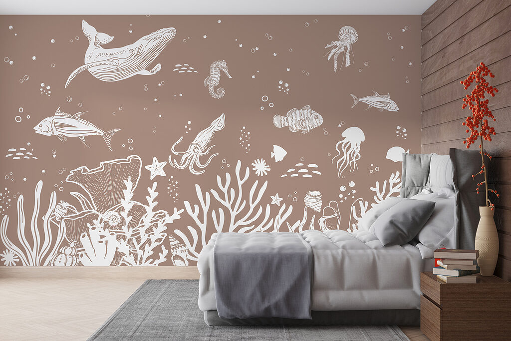 A white line drawing of sea animals