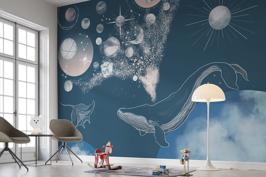 Una ballena y planetas en el cielo