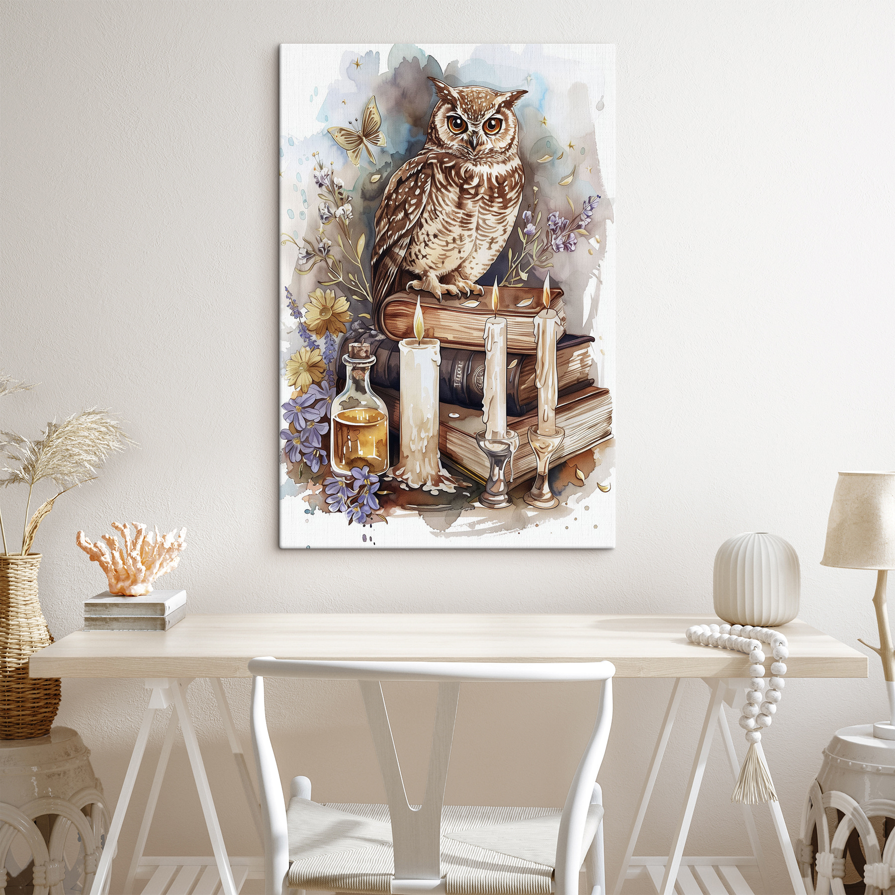 An owl sitting on a stack of books with candles and flowers