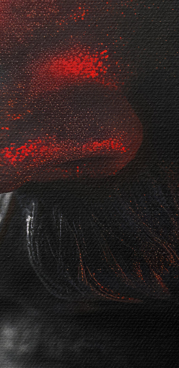A statue of a man with red eyes