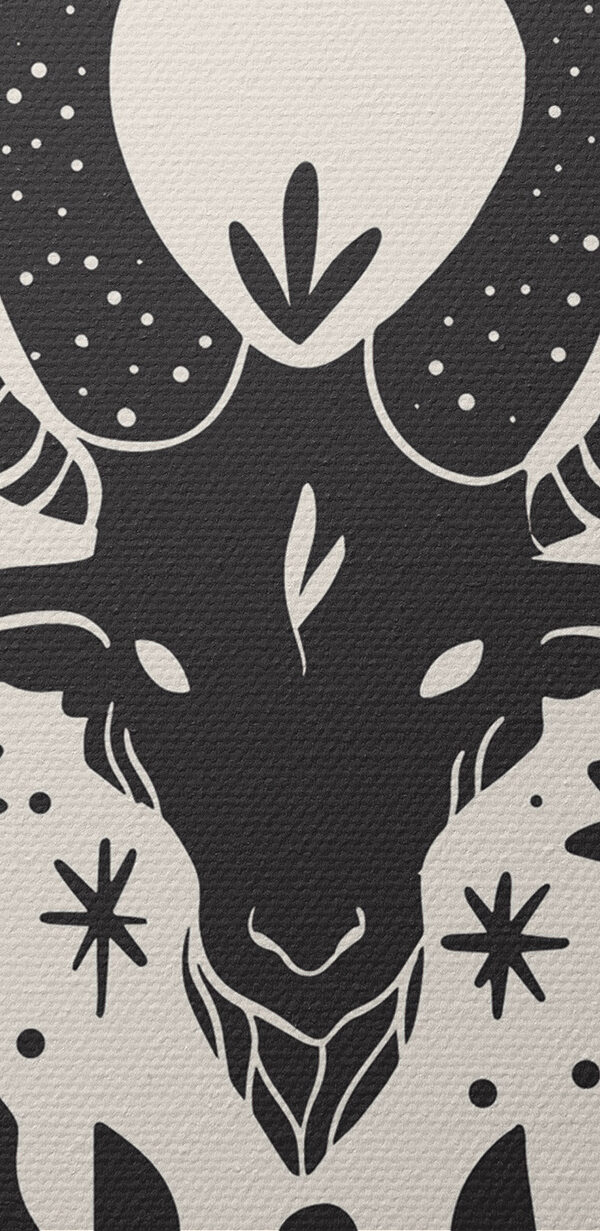 A black and white drawing of a goat with horns and leaves A black and white drawing of a goat with horns and leaves