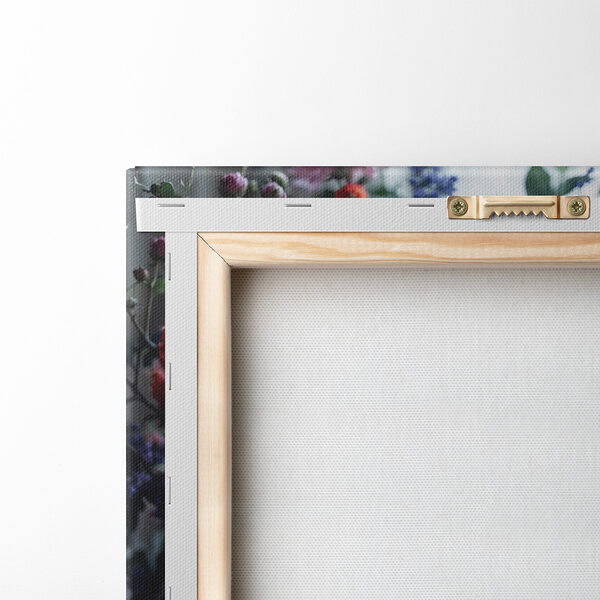 A vase of flowers on a window sill A vase of flowers on a window sill