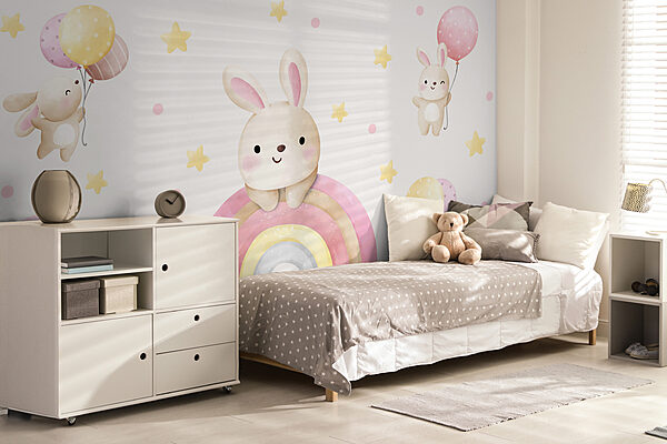 A cartoon bunny on a rainbow