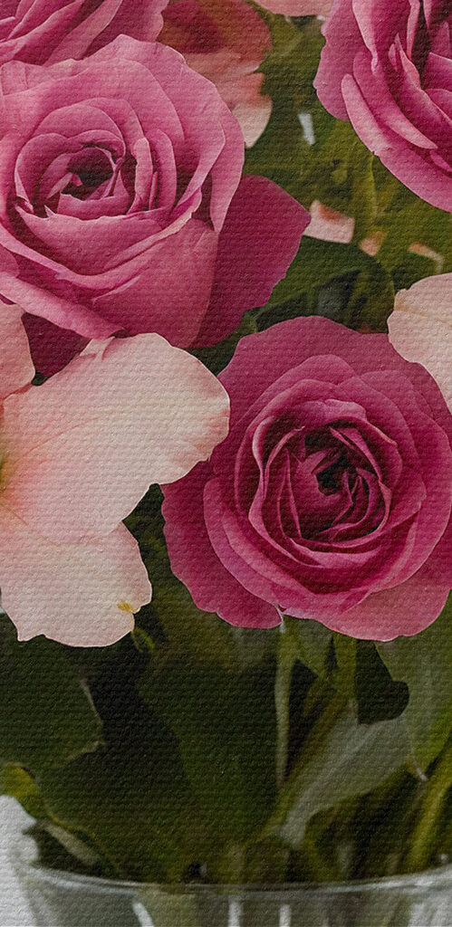 Vase of pink and purple flowers
