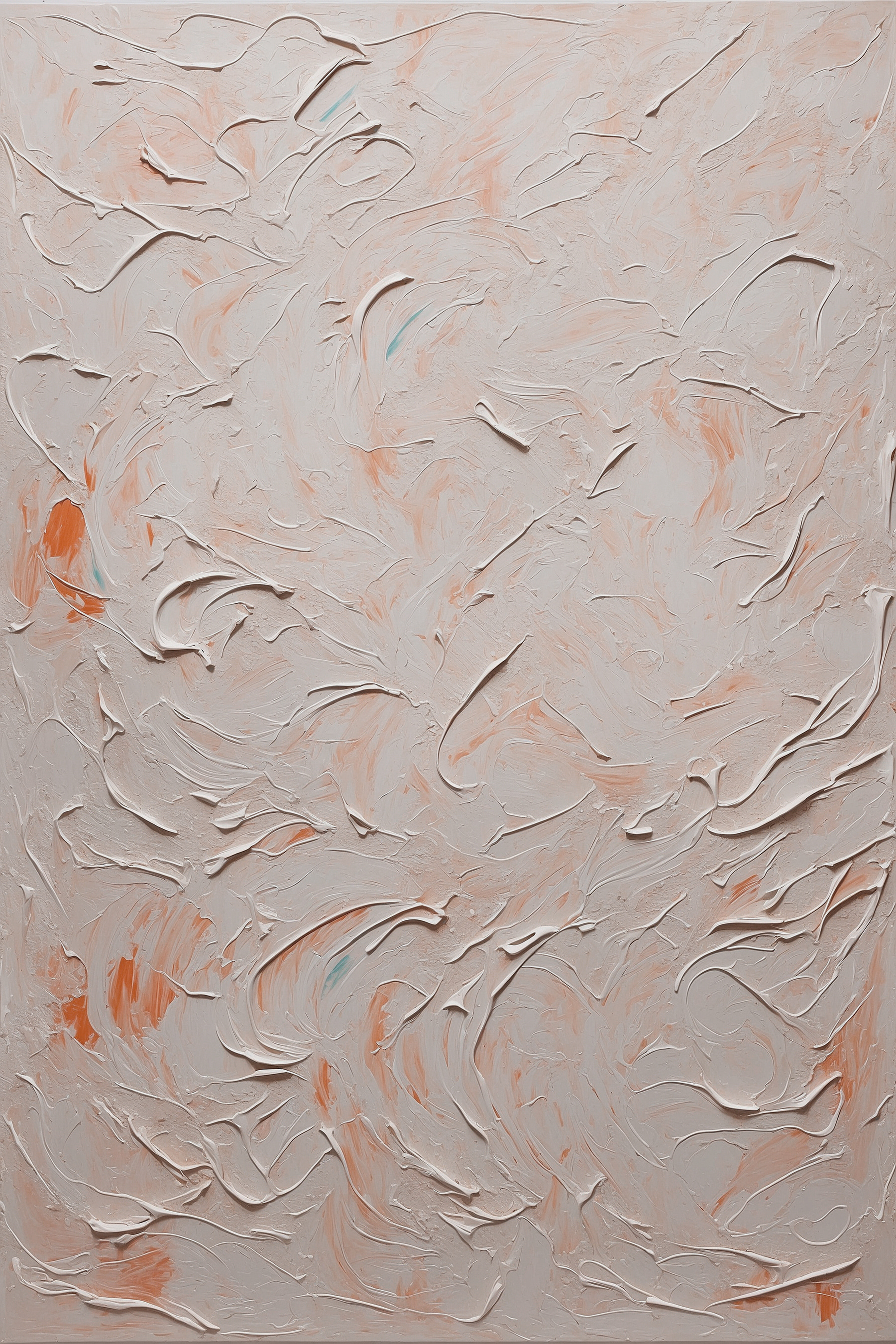 White and orange paint on a white surface