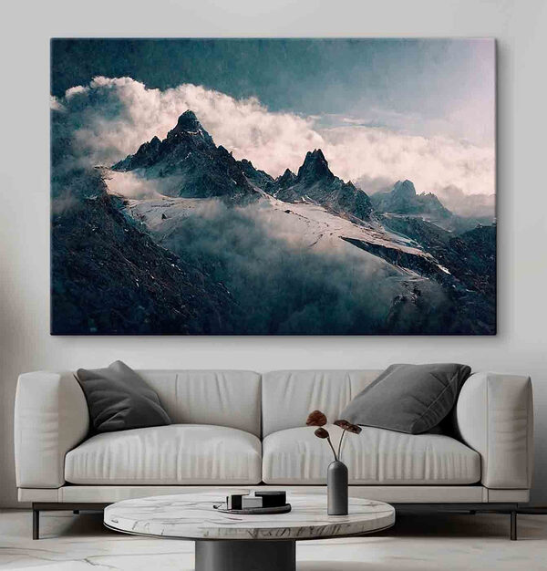 Snowy mountain tops with clouds