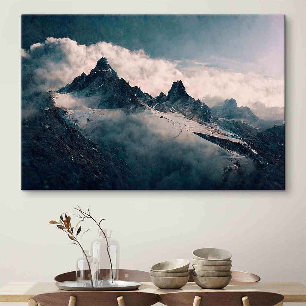 Snowy mountain tops with clouds