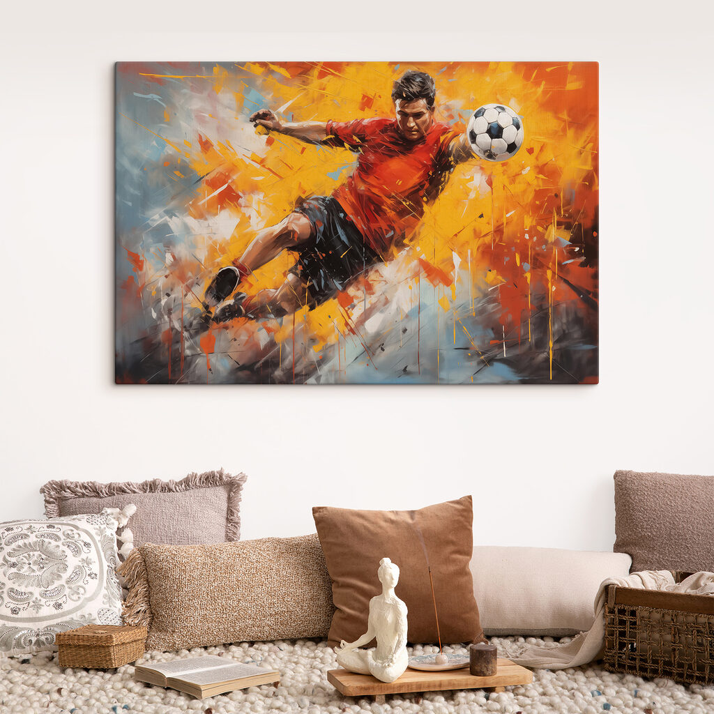 Man in a red shirt kicking a football ball