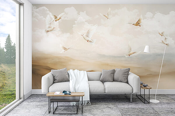 Group of white birds flying in the sky