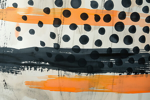 Black and orange paint on a white surface Black and orange paint on a white surface