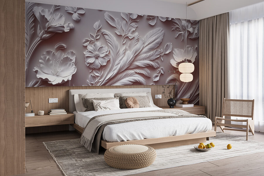 Pared blanca con flores y hojas