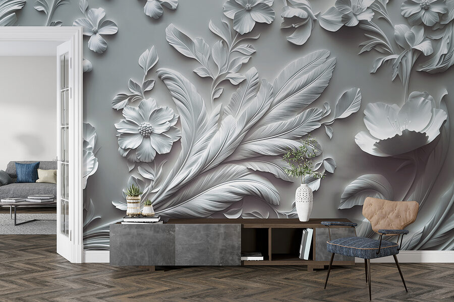 Pared blanca con flores y hojas