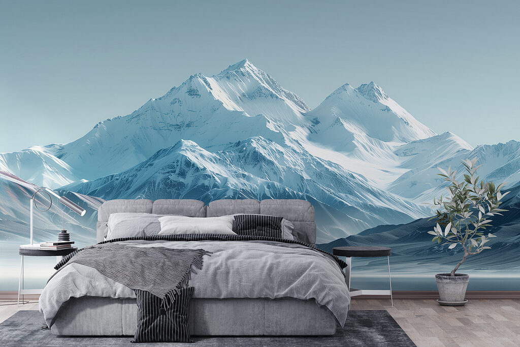 Snowy mountain range with a body of water