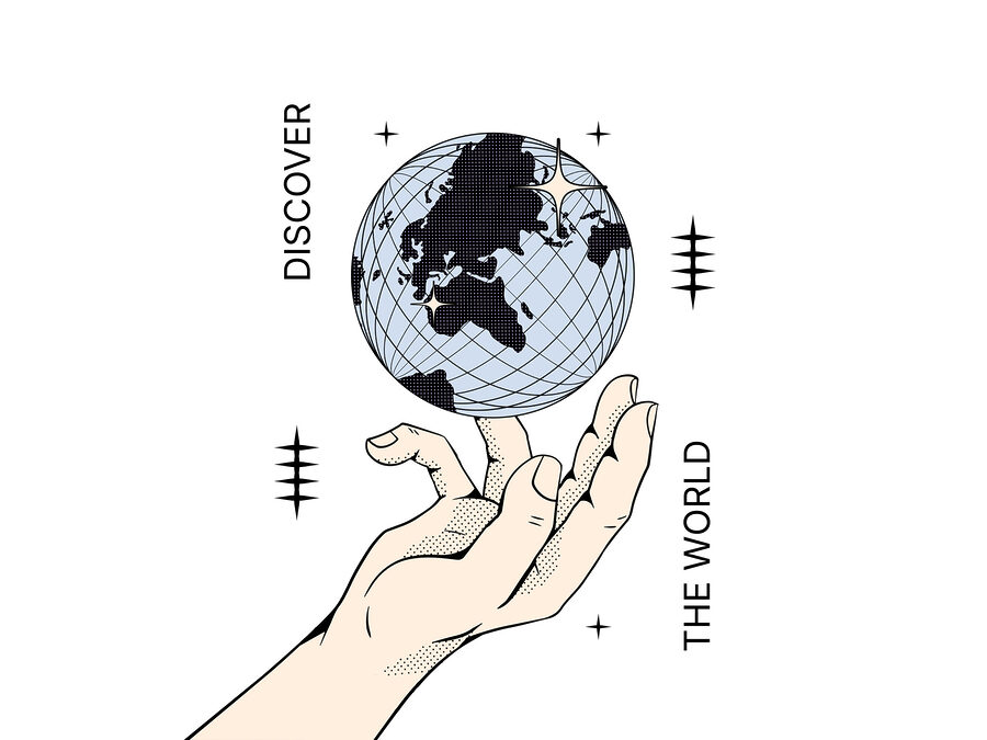 Mano que sostiene un globo terráqueo
