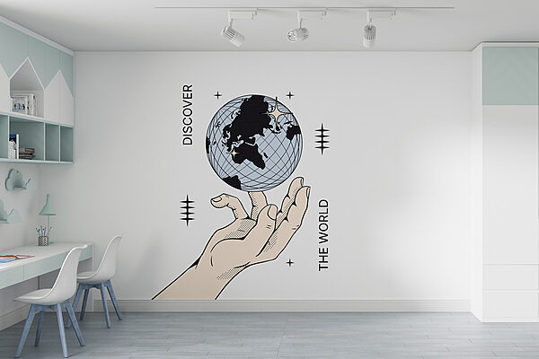 Mano que sostiene un globo terráqueo Mano que sostiene un globo terráqueo