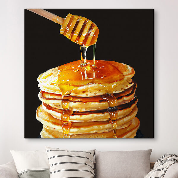 Stack of pancakes with honey dripping from a wooden stick