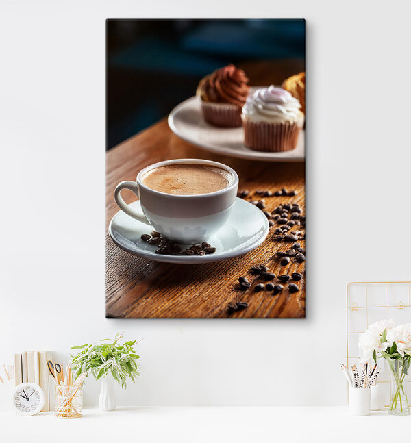 Cuadros Cuadros Una taza de café y unos cupcakes sobre una mesa (SKU: s40417)