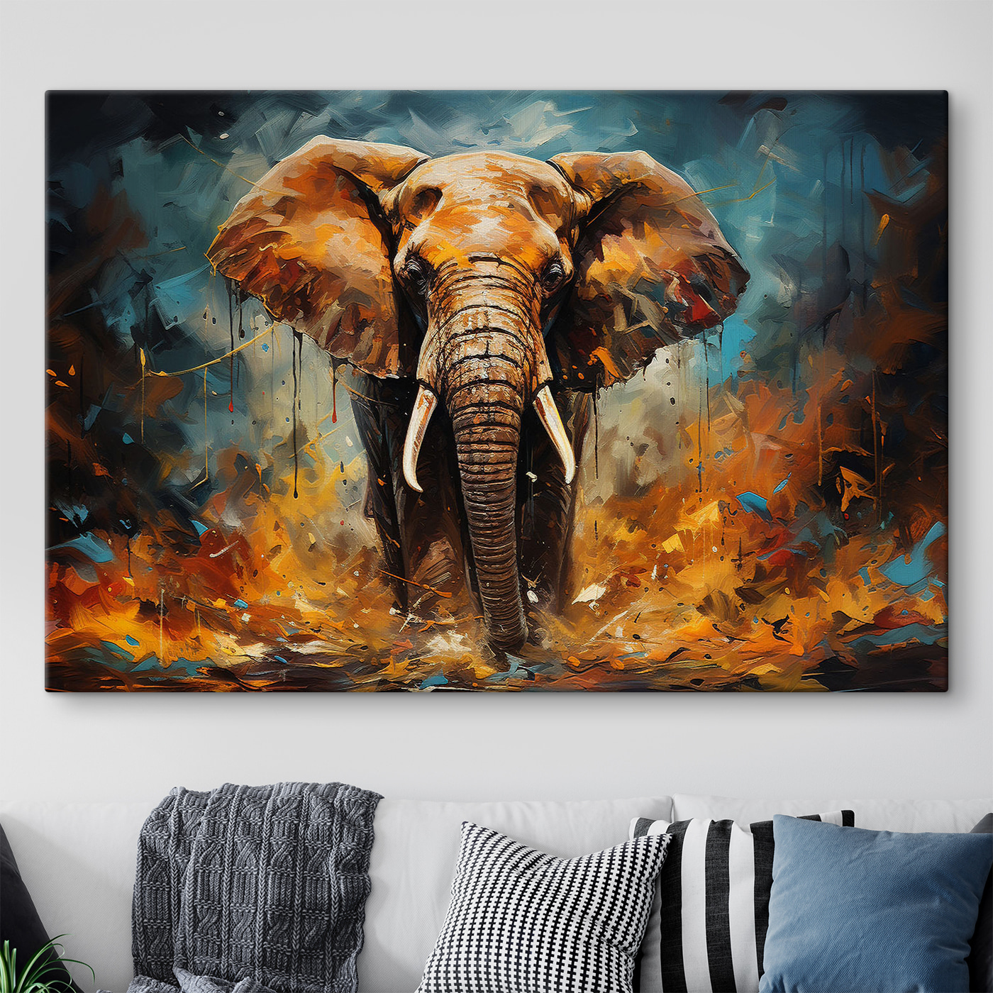 An elephant with tusks and dirt