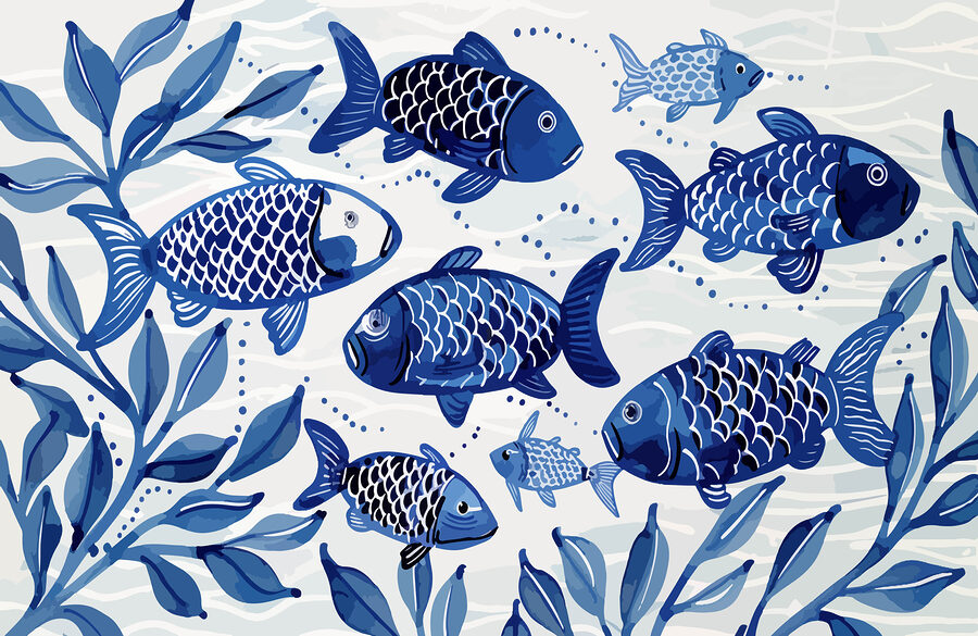 Grupo de peces azules nadando en el agua