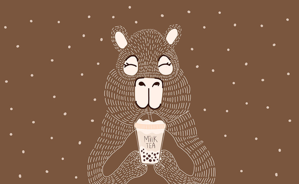 Cartoon animal holding a cup of milk tea Cartoon animal holding a cup of milk tea