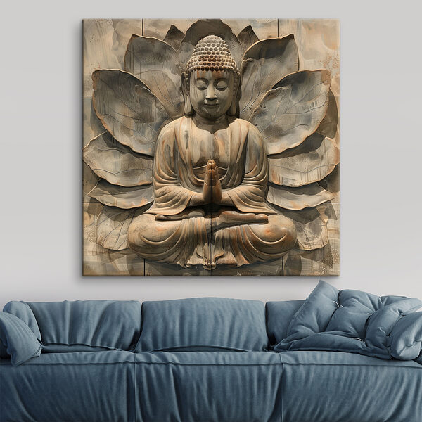 Stone statue of a person sitting in a lotus pose Stone statue of a person sitting in a lotus pose