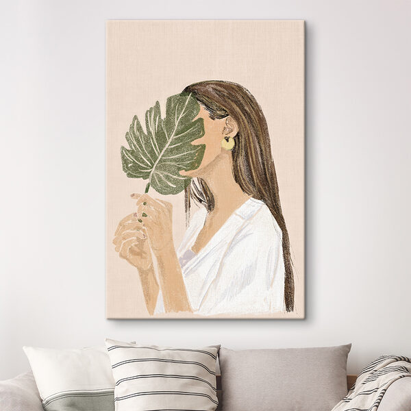 Woman holding a leaf Woman holding a leaf