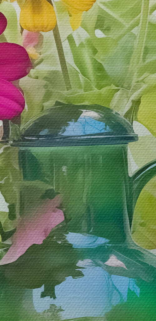 Green teapot with colorful flowers Green teapot with colorful flowers