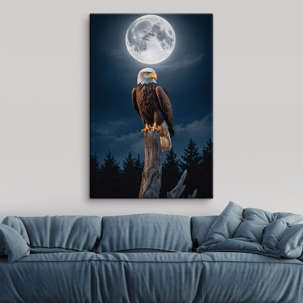 Bald eagle on a post with a full moon in the background Bald eagle on a post with a full moon in the background