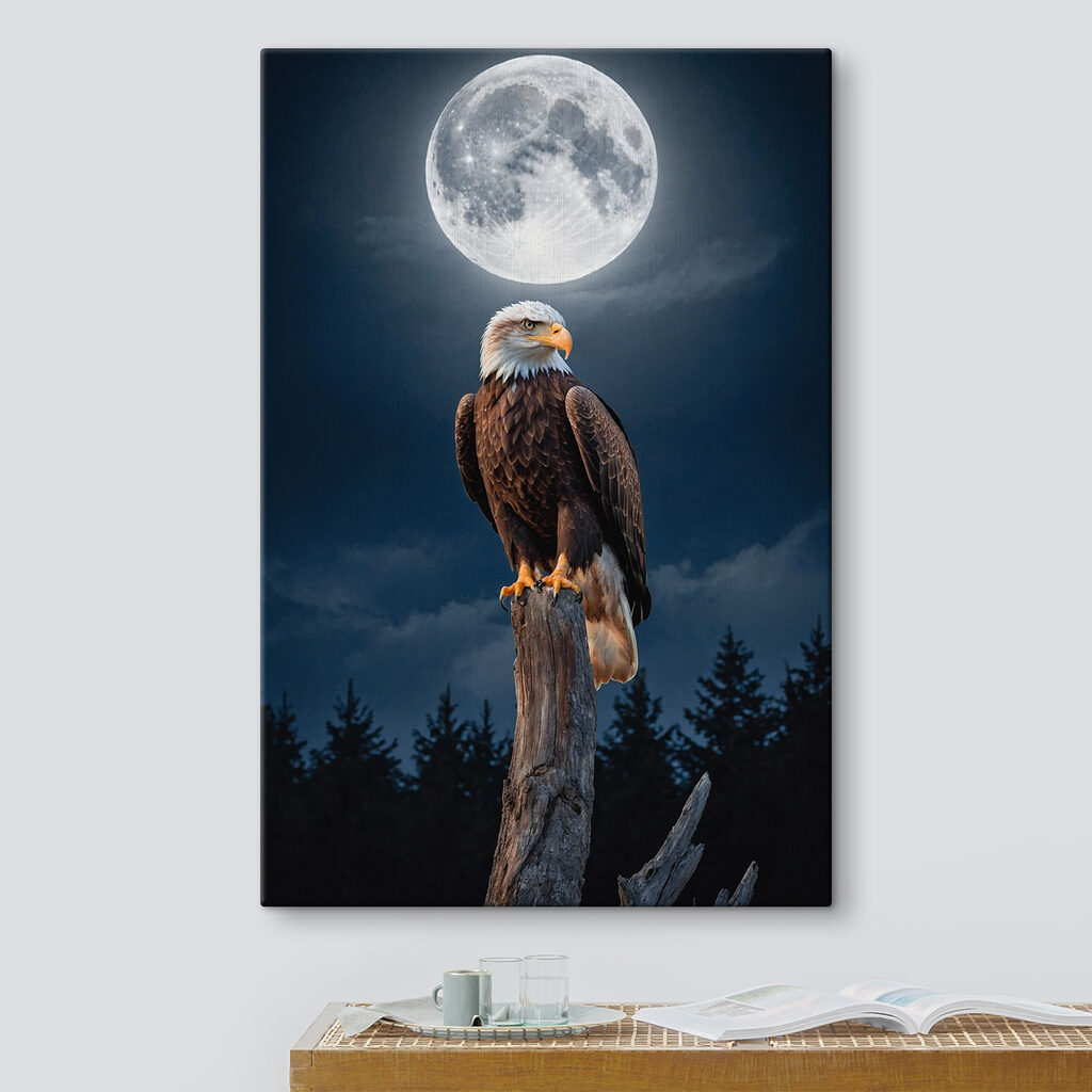 Bald eagle on a post with a full moon in the background Bald eagle on a post with a full moon in the background