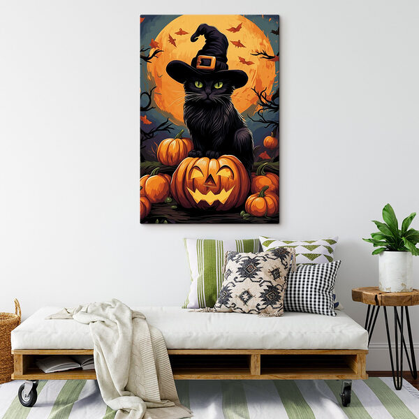 Cuadros Gato con un sombrero sentado sobre una calabaza