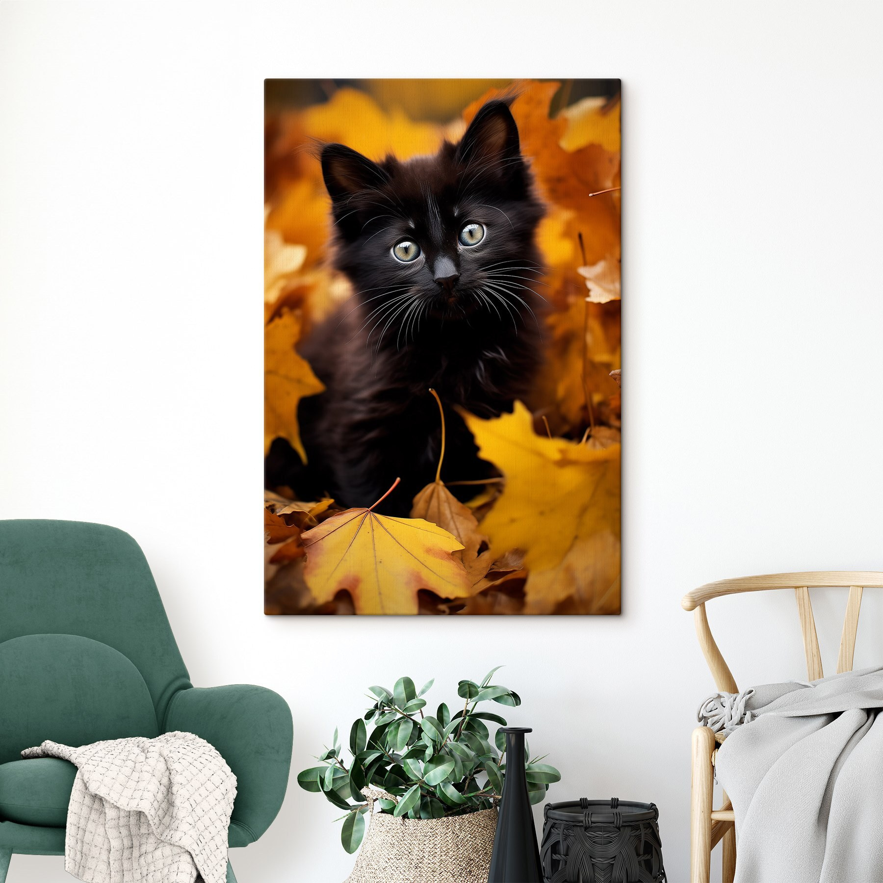 Black kitten in a pile of leaves
