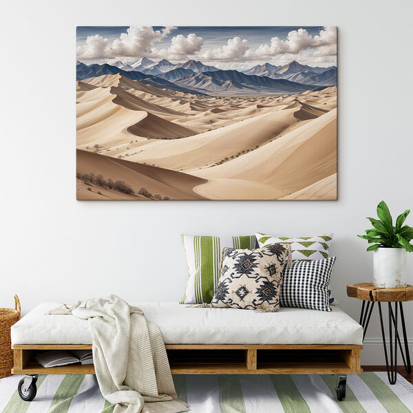 Large sandy hills with mountains in the background