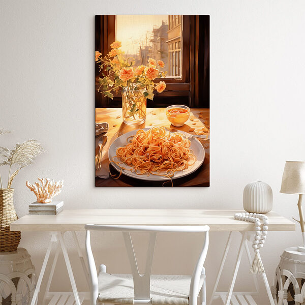 Plate of pasta and a vase of flowers
