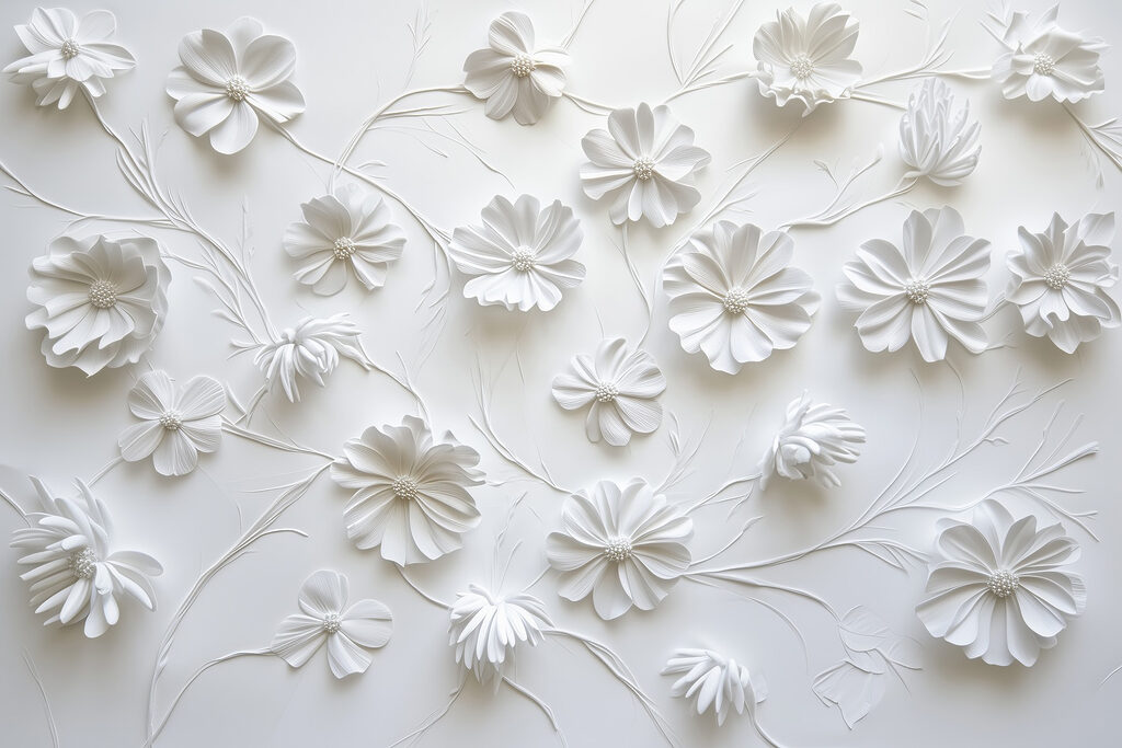 Flores de papel blanco sobre una superficie blanca Flores de papel blanco sobre una superficie blanca