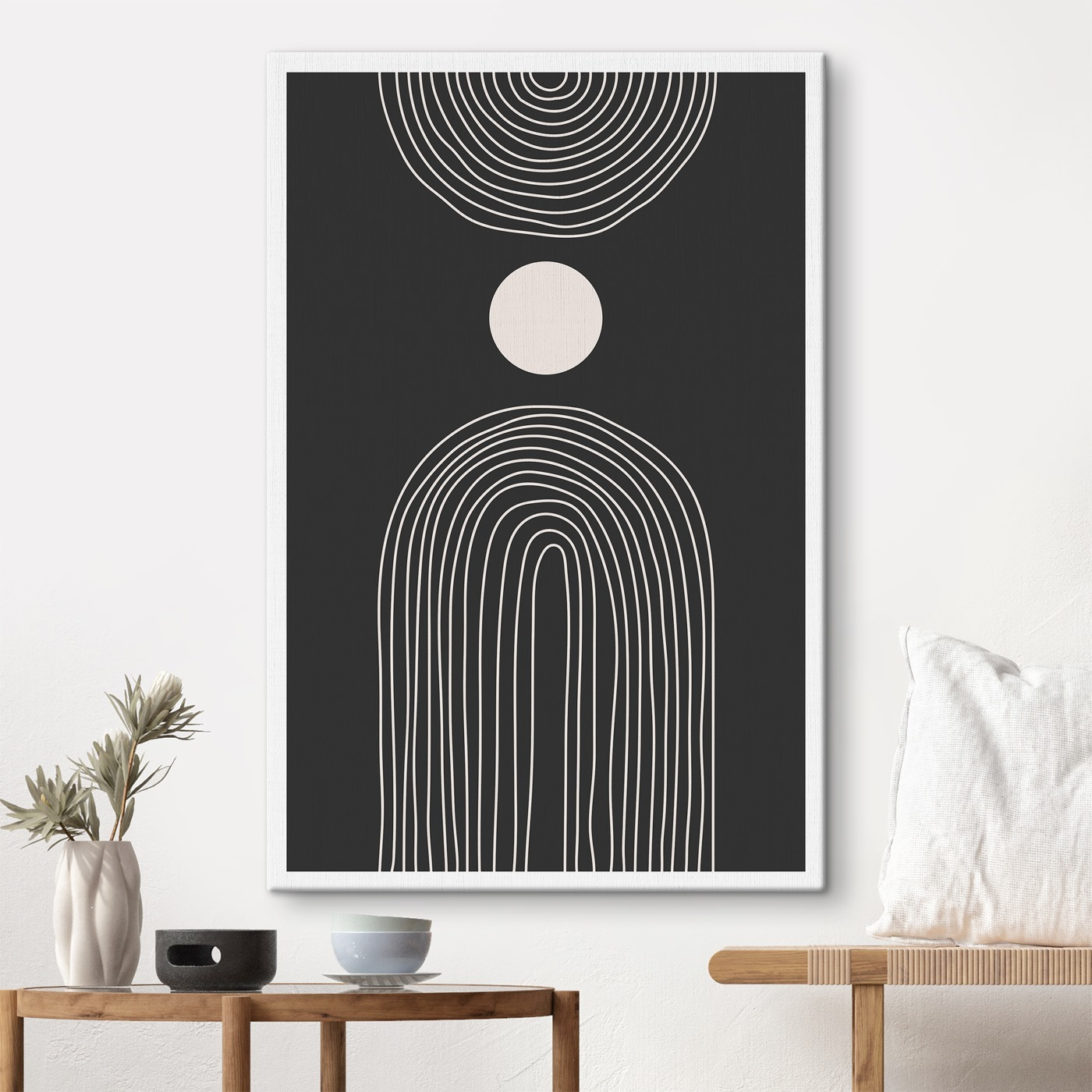 Black and white poster with a white circle and a black and white rainbow