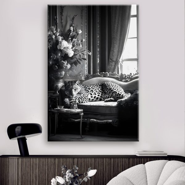 Leopard lying on a couch Leopard lying on a couch