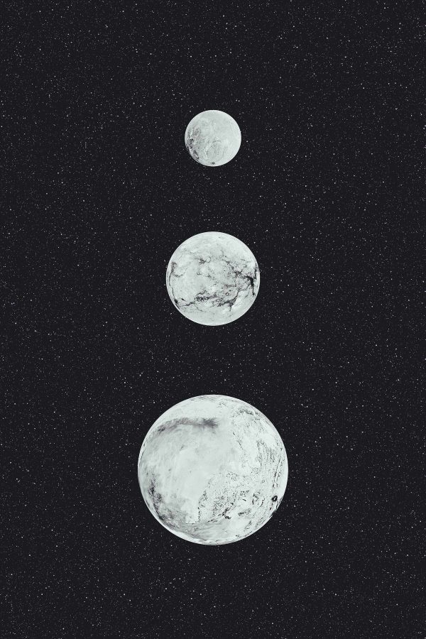 Group of white planets in a row Group of white planets in a row