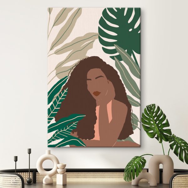 Cuadros Mujer con el pelo largo y un fondo verde con hojas