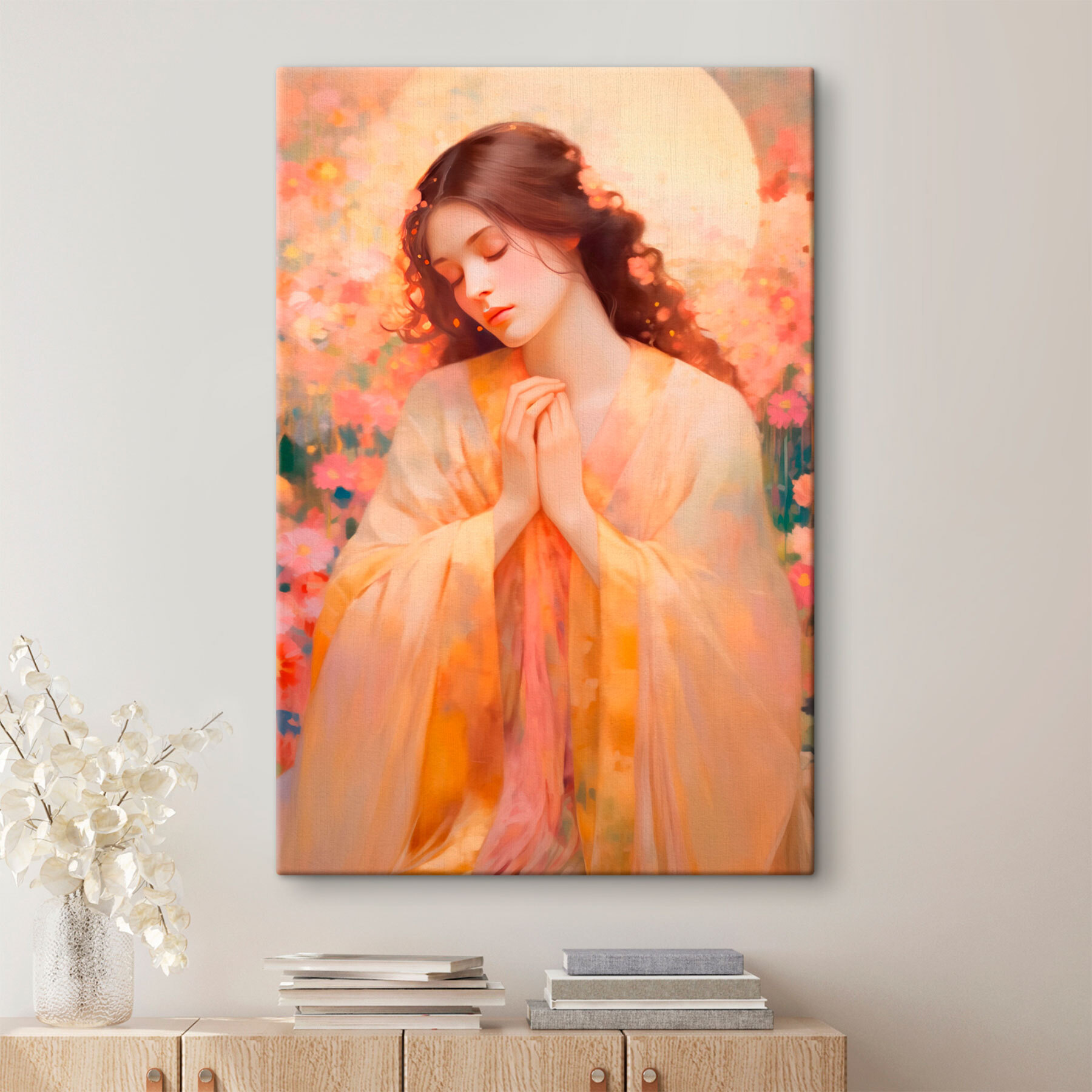 Woman in a robe with her hands together in front of a flowery background Woman in a robe with her hands together in front of a flowery background