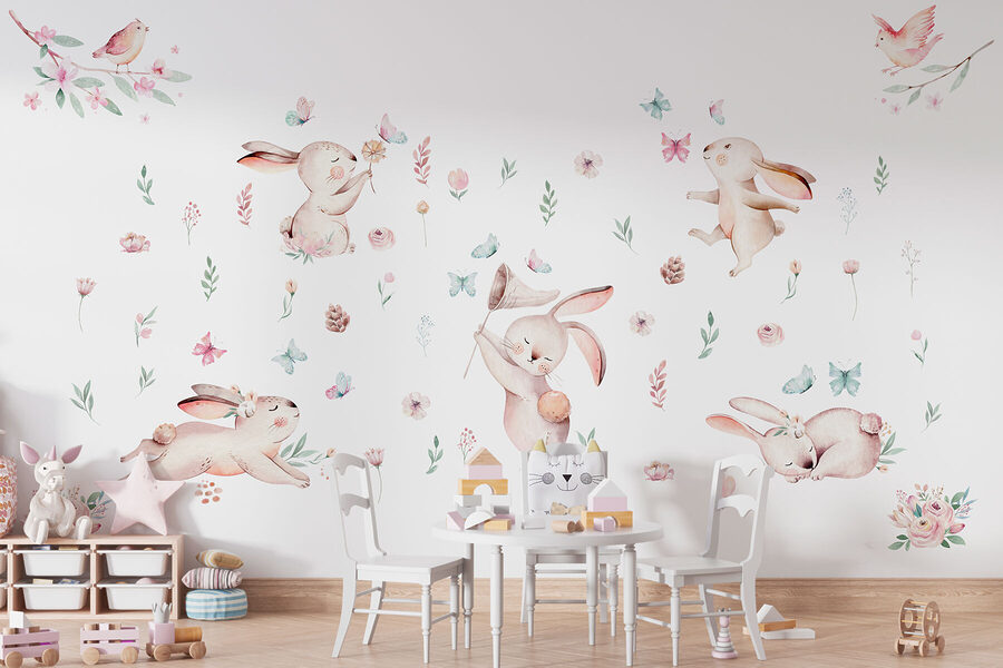 Grupo de conejos con flores y mariposas