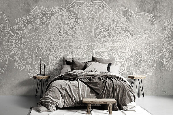 Diseño ornamental blanco sobre una superficie gris Diseño ornamental blanco sobre una superficie gris
