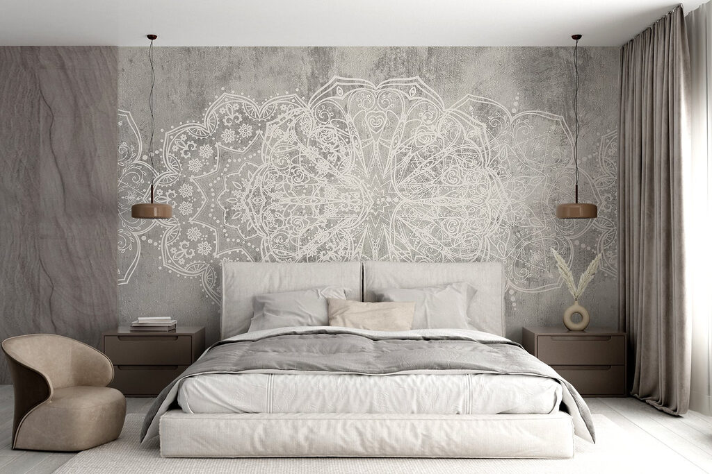 White ornate design on a grey surface