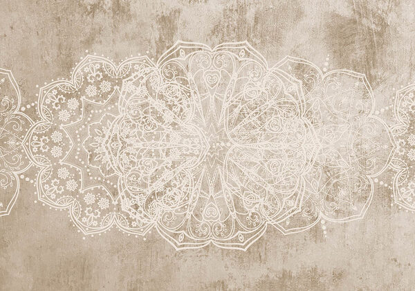 Diseño ornamental blanco sobre una superficie marrón Diseño ornamental blanco sobre una superficie marrón