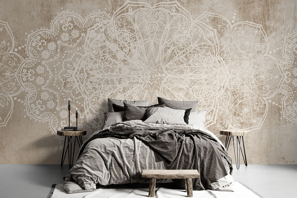 White ornate design on a brown surface