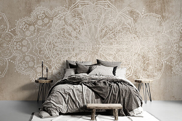 Diseño ornamental blanco sobre una superficie marrón Diseño ornamental blanco sobre una superficie marrón