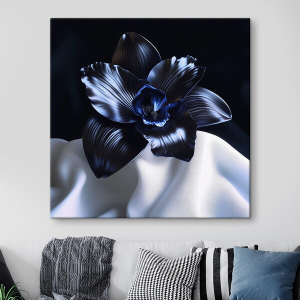 Cuadros Una flor negra sobre un paño blanco