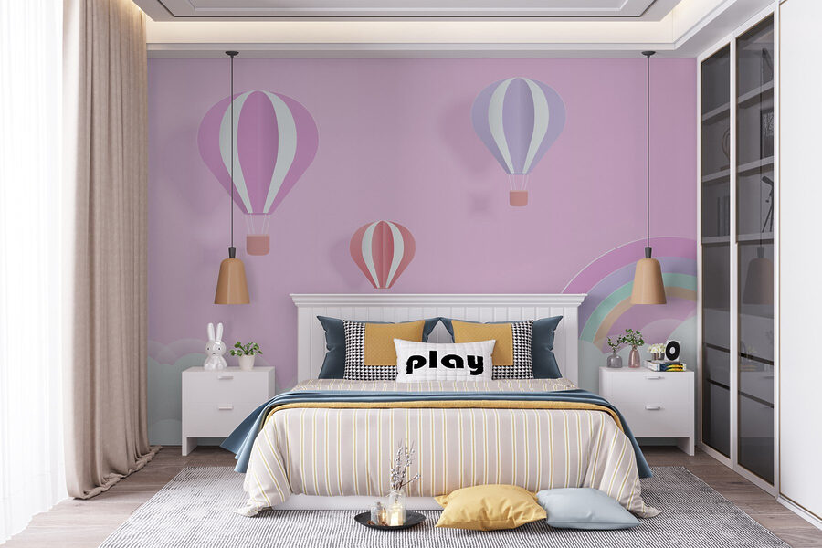 Fondo rosa con globos y un arco iris