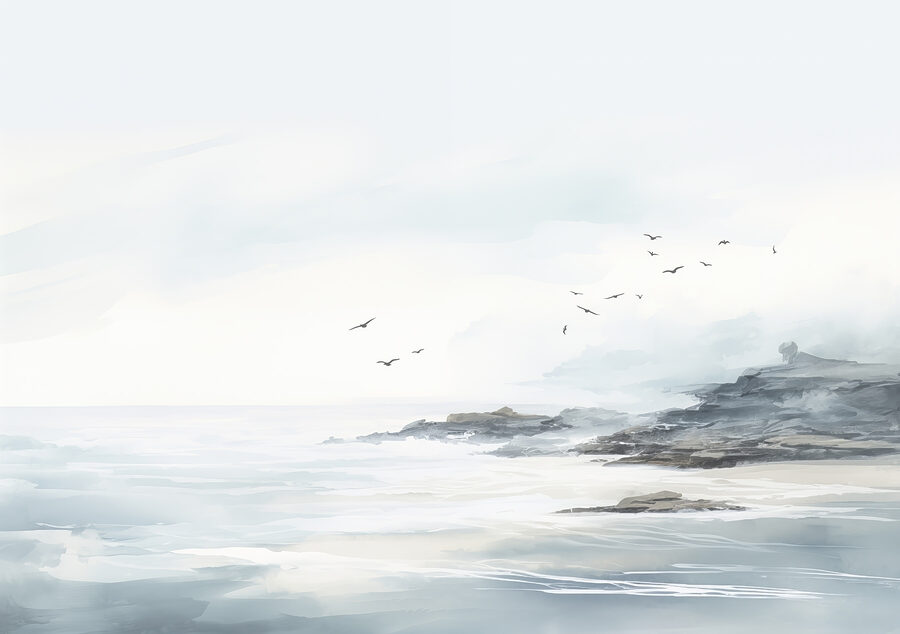 Pájaros volando sobre una playa rocosa