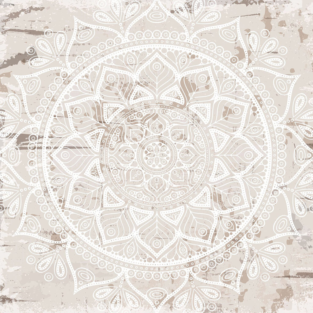 White mandala on a brown surface White mandala on a brown surface